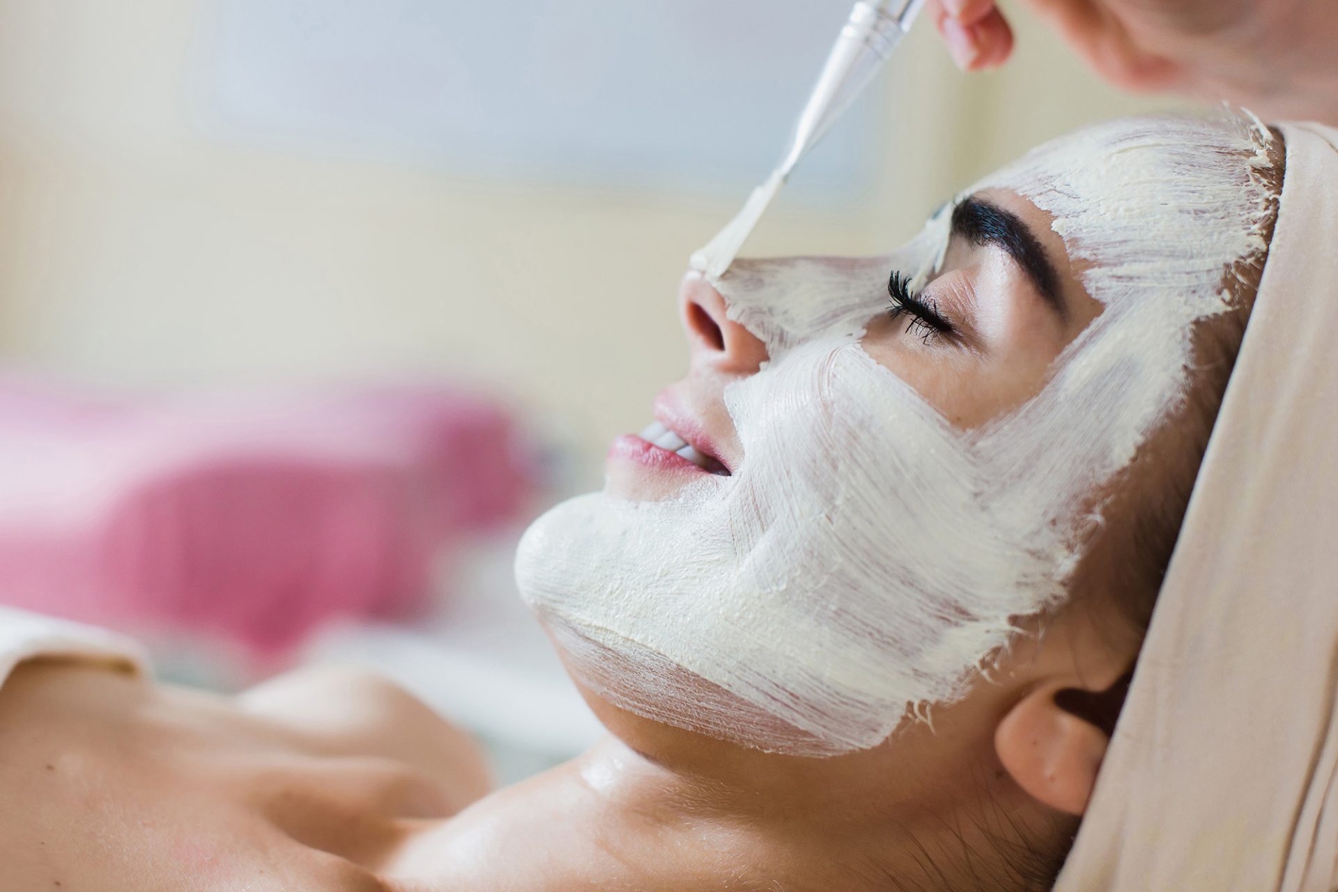Spa facial mask application. Spa beauty organic facial mask application at a day spa salon.
